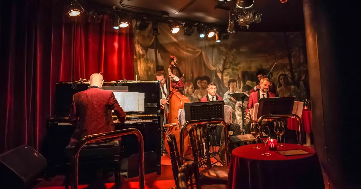 The live quintet playing in the red Rojo Tango cabaret at the Faena Hotel, Buenos Aires